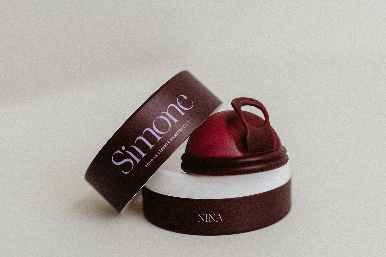 disque menstruel dans sa boîte